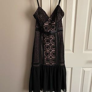 Glamorous black and pink lace midi dress.